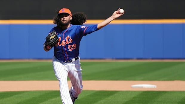 New York Mets relief pitcher Sean Manaea (59) throws batting practice during workouts at spring training.